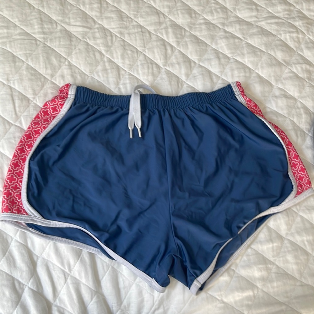Navy and pink work out shorts.
